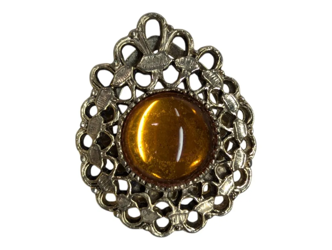 Assorted honey-tone brooches