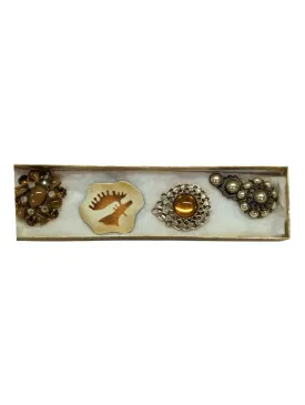 Assorted honey-tone brooches